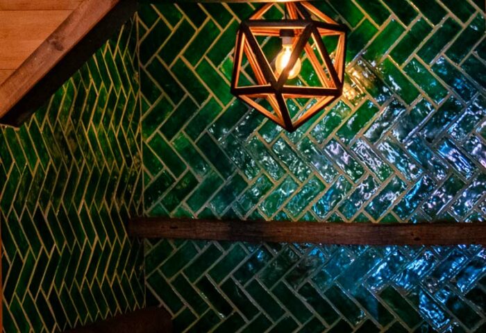 Emerald green tile installation by McMillan Interior Design