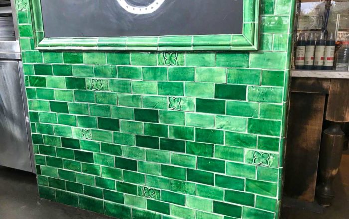 emerald green glaze tile accent wall
